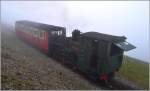 Der Mount Snowdon mit seinen 300 Nebeltagen ist vergleichbar mit dem Brocken und so geschah es auch an diesem Tag, dass kurz vor der Gipfelstation auf 1050m pltzlich der Nebel aufzog.