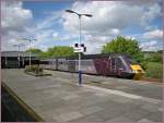 In Plymouth wartet der Cross Country 1224 HST Service mit dem Triebkopf 43366 an der Spitze auf die Abfahrt ins weit entfernte Glasgow Central. 
21. Mai 2014 