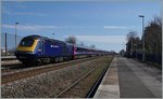 Ein Great Western Railway HST 125 Service 13:05 von London Paddington nach Plymouth mit dem Triebköpfen 43088 und 43028 bei der Durchfahrt in Dawlish Warren.