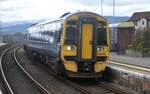 ScotRail 158715 am 22.02.2024 bei der Einfahrt in den Bahnhof Invergordon.
