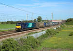 88002 passes Winwick Junction whilst hauling the 0548 Mossend - Daventry intermodal, 27 May 2020