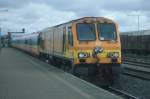 IERLAND sep 2003 LIMERICK JUNCTION LOC 217 oranje met personen trein