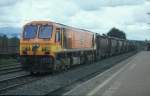 IERLAND sep 2003 LIMERICK JUNCTION LOC 210 oranje met cement wagons