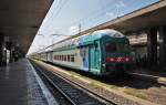 Hier R12212 von	Nettuno nach Roma Termini, bei der Einfahrt am 15.7.2011 in Roma Termini.