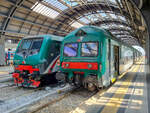 Doppelstocksteuerwagen EA 850 von Trenord mit einem Regionalzug in Milano Centrale, 26.07.2022.
