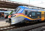 Farbenpr�chtig: ETR 104 103 im Bahnhof Palermo C.