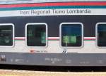 Beschriftung eines nB-Peronenwagens der TILO (Treni Regionali Ticino Lombardia)), aufgenommen am 15.07.2007 in Tirano.