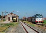 FS D345 1115 hauling a car-transport train crosses Belgioioso station on the 13th of June in 2009