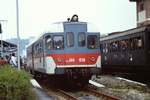 23 spet 1984, ALn 668.1550 at Montiglio station meet a special steam train.