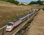 Der von Sergio Pininfarina designte ETR 500-Triebkopf (Monotensione) mit der Ordnungsnummer 414 123  FRECCIABIANCA  war am 18.05.2014 mit dem Eurostar ES 9701 von Milano Centrale nach Venezia Santa Lucia unterwegs, und wurde von mir in San Giorgio in Salici fotografiert. 