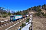E 412 012 mit einem Schrottzug am 23.03.2019 bei Tarvisio.