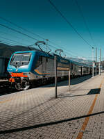 TI E464.203 und TI E464.178 warten am 23.05.2026 mit ihrem Treno Regionale im Bahnhof Tarvisio Boscoverde auf die Abfahrt nach Triest.
 
Zug: R 16649
Laufweg: Tarvisio Boscoverde ➤ Udine ➤ Palmanova ➤ Monfalcone ➤ Trieste Centrale