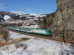 Eine E 464 mit einem Regionalzug am 25.01.2014 unterwegs bei Sterzing.