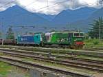 Dieses ungleiche Lokprchen, bestehend aus DE 550-17 und E 483.008 fuhr mit seinem Gterzug am 27.Juli 2009 in Domodossola ein, umfur den Zug einmal, um den Bahnhof dann in entgegengesetzter Richtung