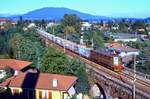 E636 454 ist bei Lesa zwischen Domodossola und Milano entlang des Lago Magiore sdwrts unterwegs, 03.09.1994.