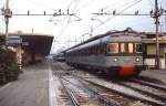 An einem Septemberabend 1986 verlässt ein ALe 601 den Bahnhof Bologna.