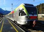 ETR 170 043-3 als R/REX 1863 (Fortezza/Franzensfeste - Lienz) am 18.12.2015 beim Halt in San Candido/Innichen.