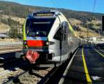 ETR 170 026-8 als REX/R 1860 (Lienz - Fortezza/Franzensfeste) am 18.12.2015 beim Halt in San Candido/Innichen.