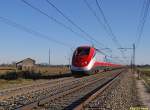 FS ETR500 train 30 (sideA) painted in the new  FrecciaRossa  brand livery running as ES9493 (Milano Centrale - Roma Termini) near Fontana Fredda on the 23rd of November in 2008