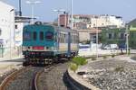 Am 29.09.2011 steht in der Station von Porto Torres Marittima der ALn 663 1103 bereit zur Abfahrt als Regionalzug 8903 nach Sassari.
