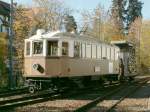 Lokalbahn Flair aus der k.u.k.Zeit.Zweiachser TW 12(1908)mit dem Turmwagen beim rangieren in Oberbozen.Es geht fr eine Fahrleitungreperatur auf die Strecke.Oberbozen 16.10.07