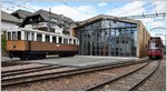 Rittner Schmalspurbahn Maria Himmelfahrt - Oberbozen - Klobenstein. Be 4/8 24 ex Trogenerbahn und Alioth Altbautriebwagen aus Münchenstein vor dem neuen Depot in Oberbozen. (16.04.2016)