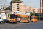 Italia, Roma, ATAC  Tramways 9021 on line 19 and 7113 on line 14, Piazza Porta Maggiore  20/7/2006