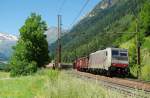 186 284 Lokomotion / RTC mit einem Schrottzug am 01.08.2013 in Colle Isarco gen Bolzano.