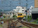 Serie 105 im Hinterland von Fukuyama: Die Stadt Fukuyama liegt in der Präfektur Hiroshima an der Inlandsee weit im Westen von Japan; dreitürige elektrische Züge Serie 105 fahren bis an