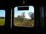 Auf der Fahrt in Wagen 2004 - eine wunderschne Landschaft mit sanften Wldern und Reisfeldern.