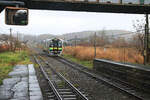 An der alten Hauptlinie von der Hafenstadt Hakodate nach Sapporo, Südseite des Passes über Kutchan: Als einer der verbliebenen ganz wenigen Kurse erreicht der Gegenzug (Triebwagen H100-3)