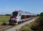 Der von TŽV Gredelj gebaute Triebwagen 7022 201 war am 28. August 2015 als 3011 von Cakovec nach Zagreb unterwegs, und wurd von mir im Niemandsland nahe der Ortschaft Pusnice fotografiert. 