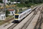 7123 015/7123 016 fahrt ein mit IC 522 Split-Zagreb Glavni Kolodvor auf Bahnhof Solin am 19-5-2015.