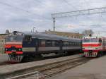 DR1A-311-6/DR1A-176.3 neben DR1A-246.4/DR1A-246.3 auf Bahnhof Riga Pasazieru am 3-5-2010.