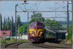 Die 1604 mit ihrem Sonderzug am Haken  dieselt  am 23.06.09 ber den dreigleisigen Streckenabschnitt kurz vor Schieren in Richtung Luxemburg. (Jeanny)