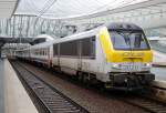 Die CFL 3020 mit SNCB wagons fhrt durch Liege Guillemins mit IC nach Luxembourg am 30.10 2010.