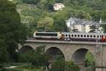 CFL 3008 an der Spitze des Schnellzugs nach Lttich auf dem Viadukt Pulvermhle in Luxemburg (25.06.2011)