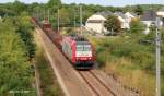 Die CFL-Werbelok 4018 passiert am 17.August 2011 mit einem Schrottzug die Fotostelle in Moutfort, an der Strecke Alzingen-Syren.
