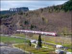 IR 3710 hat am 12.04.08 den kurzen Tunnel  Mecher  verlassen und fhrt entlang des Camping Platzes dem Bahnhof von Clervaux entgegen.