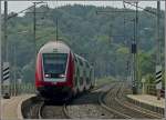 Ein Wendezug fhrt das Geflle zwischen Wecker und Mertert hinunter in Richtung Wasserbillig. Das Bild wurde am 10.08.09 an der Haltestelle Manternach aufgenommen.(Jeanny)