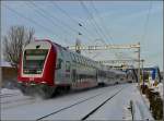 Einfahrt der RB 3214 Luxembourg-Wiltz am 25.12.2010 in den verschneiten Bahnhof von Ettelbrck. (Hans)