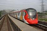 rapidKL MRT-Garnitur 210 (Hersteller: HAP Consortium, Hyundai Rotem + Apex Communications + POSCO Engineering, Type: EMU) Spitzname  Ducky  am 12.März 2024 auf der Putrajaya Line (PY) zwischen den Stesen's Sri Damansara Barat (PY06) und Sri Damansara Damai (PY05).