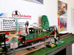 Diorama Spur 0 Antik 1930er/1950er Jahre M�rklin E-Lok RV 890 (Uhrwerk) mit einem kurzen G�terzug PW