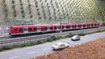 ET 423 im Regioverkehr in den Weinbergen von Harrstadt gesehen , Modell Roco  63050 digital
