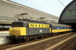 NS 1107 mit einem Schnellzug nach Port Bou, Amsterdam, 22.09.1988 - Scan vom Dia
