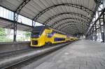 Die ganz neue IRM 9597 mit Schnellzug von Haarlem nach Beverwijk, hier in Bf Haarlem am 04.06 2011.