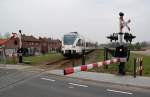 Am Sonntag den 20.2.2011 kommt ein Dieseltriebwagen der Gesellschaft Veolia von Venlo nach Roermond gefahren.
