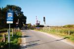 Wenn man  vom Rijksweg zuid nach Asselt fahren mchte, kreuzt man diesen Bahnbergang an der Strecke von Roermond nach Venlo.1.10.2011