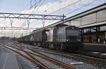 Die NBE Rail 203 163 ist mit ein Abfahlzug unterwegs nach Amsterdam Westhafen, hiet bei Durchfahrt von Haarlem am 20 marz 2012.