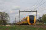 Zwei Buffels mit RE 7937 Zwolle-Enschede bei Hengelo am 7-4-2014.